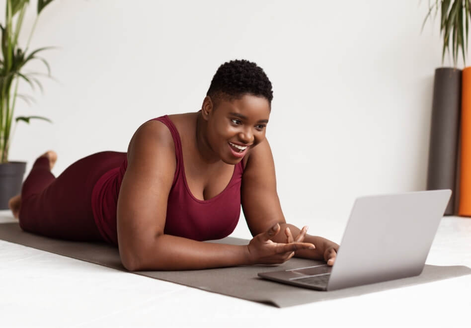happy-chubby-black-lady-having-video-chat-with-fit-2023-11-27-05-23-35-utc (1) (1)