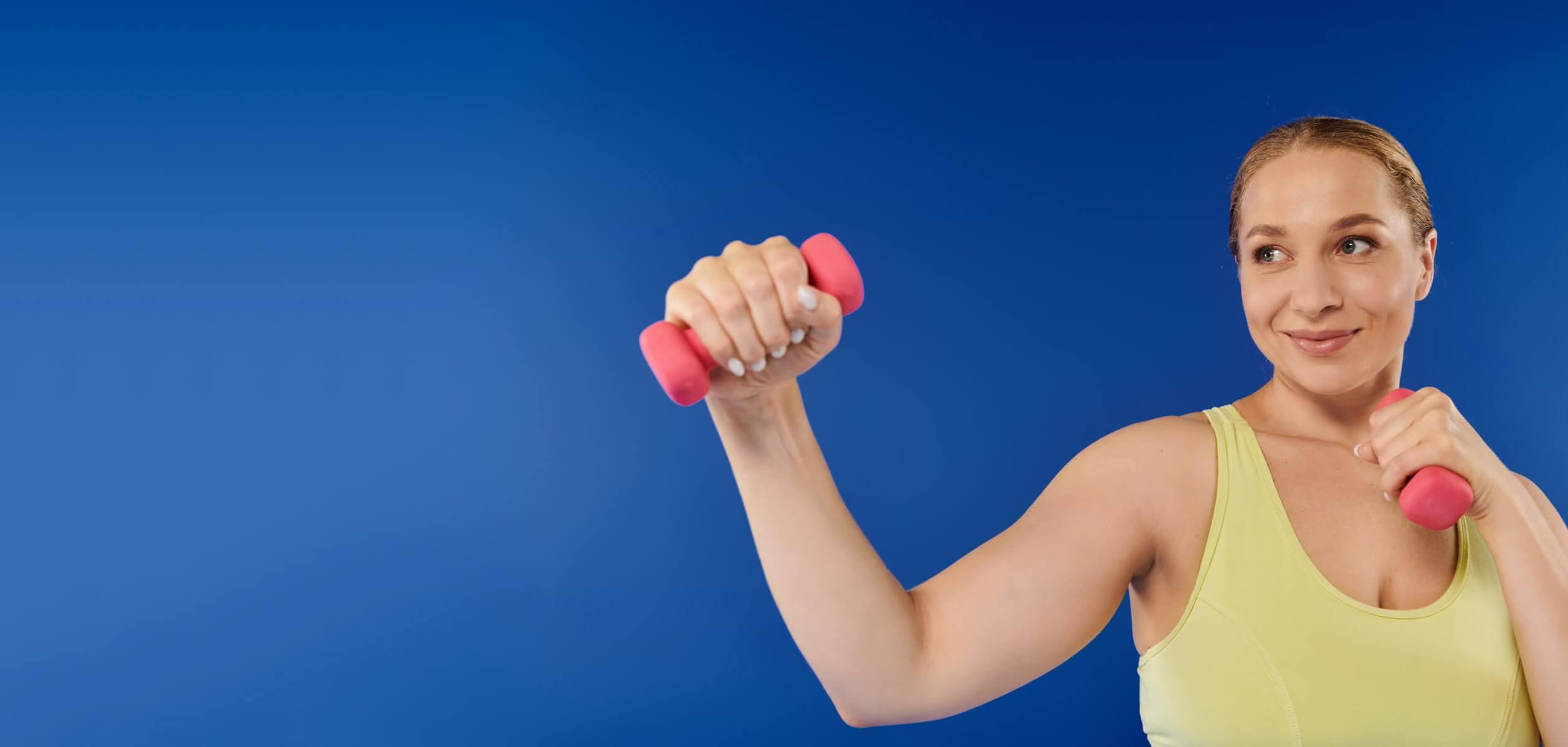 active-woman-in-a-crop-top-engages-in-strength-tra-2024-10-11-19-55-28-utc-1 (1)